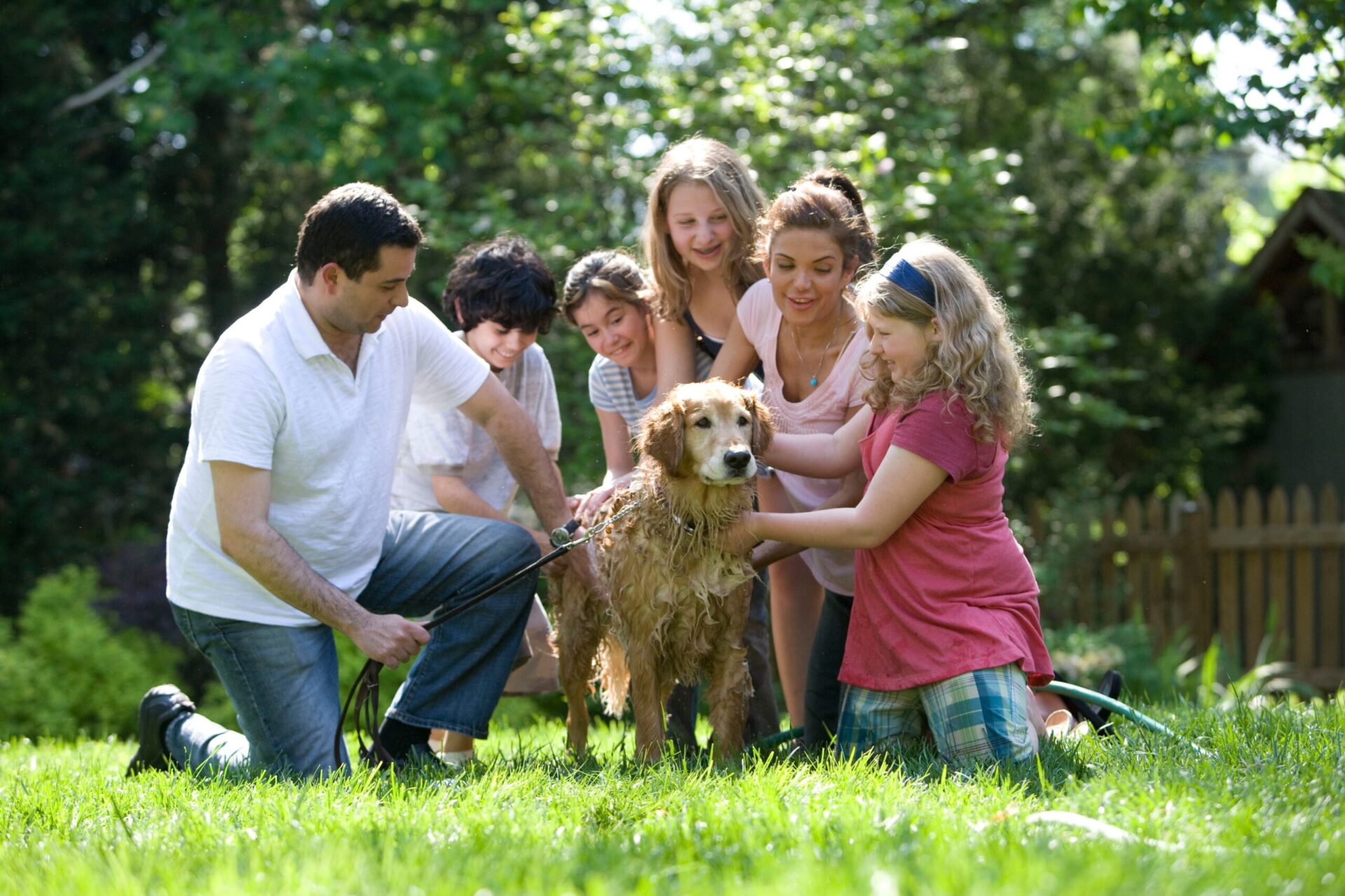 family-dog-garden-playing